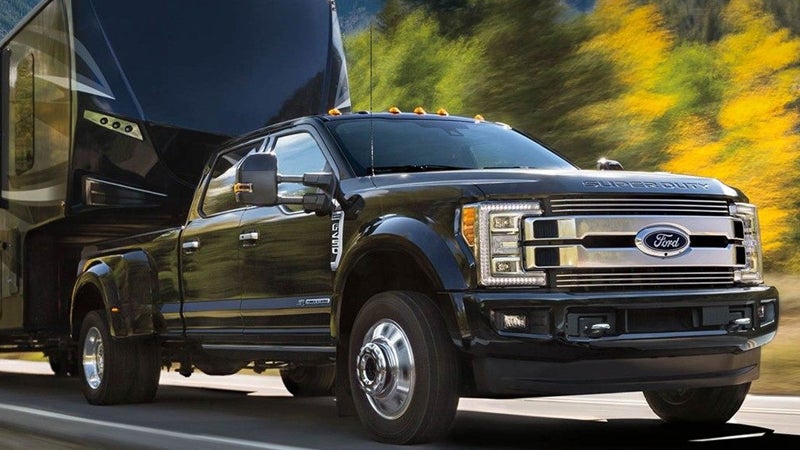 Ford Super Duty F-450 towing a gooseneck trailer