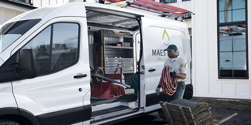Side cargo door open on Ford Transit Cargo Van