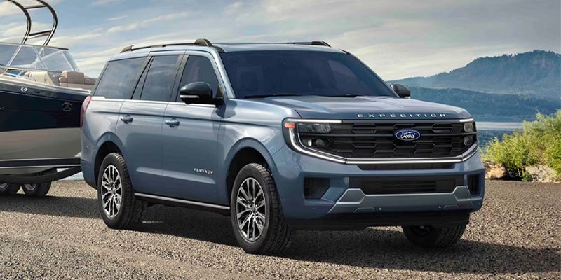 Ford Expedition parked outdoors near water