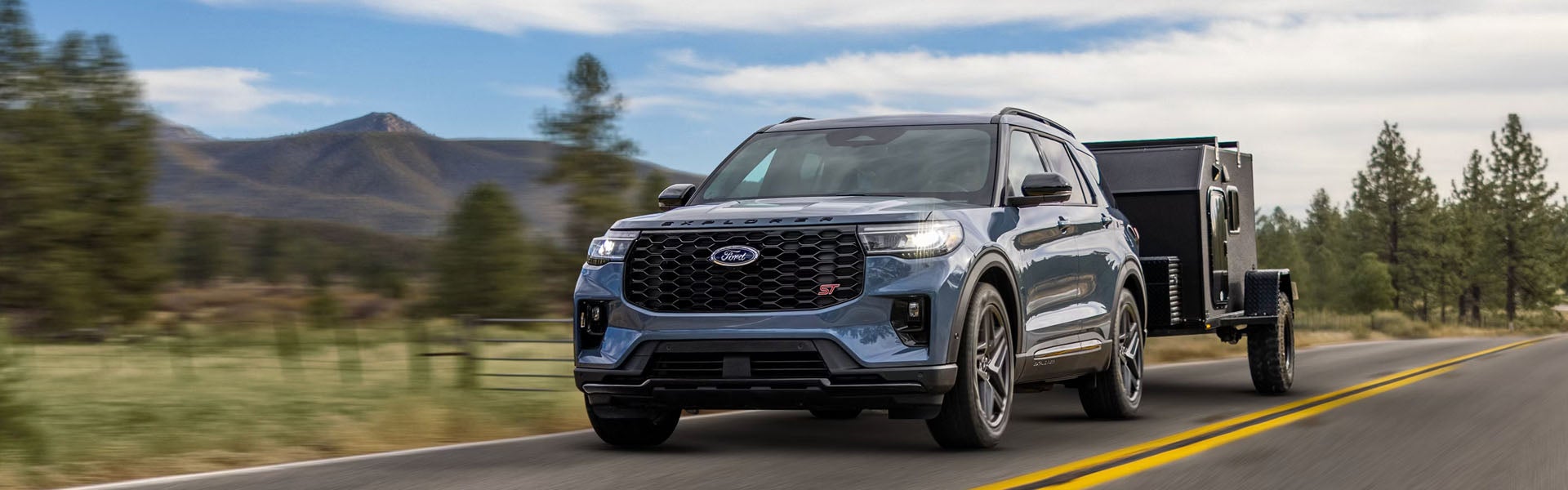 Ford Explorer SUV towing a trailer