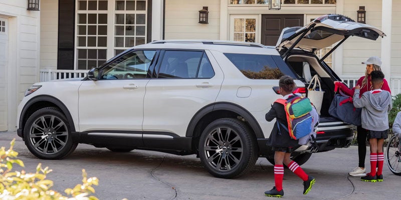 Ford Explorer SUV parked near a house